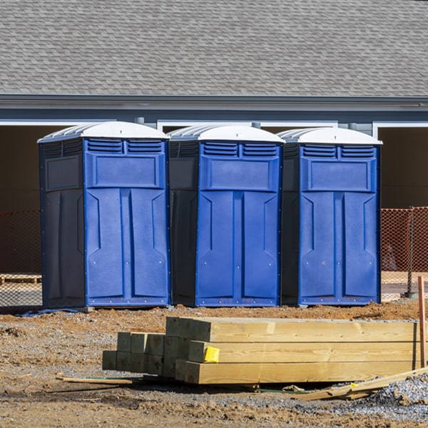 what is the cost difference between standard and deluxe porta potty rentals in Martin